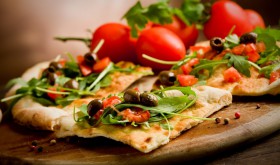 Tomato pizza with extra olives