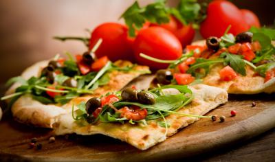 Tomato pizza with extra olives